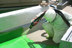 man_spraying_product